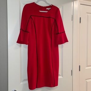 Bright red a-line dress with black detail you just NEED for work!